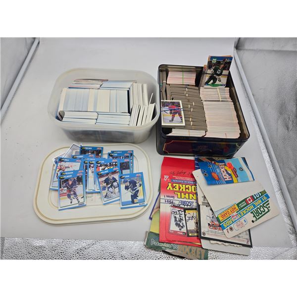 2 large containers of hockey cards