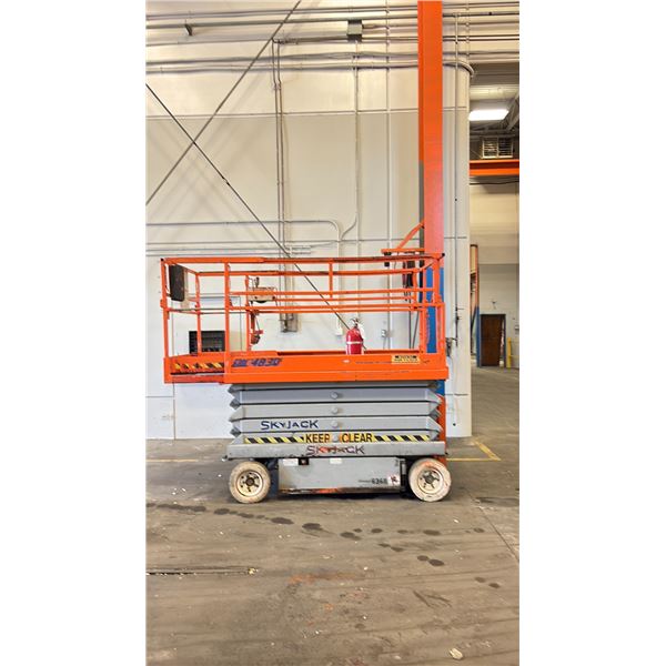 SKYJACK SJIII4830 ARIAL WORK PLATFORM ORANGE SERIAL # UNKNOWN