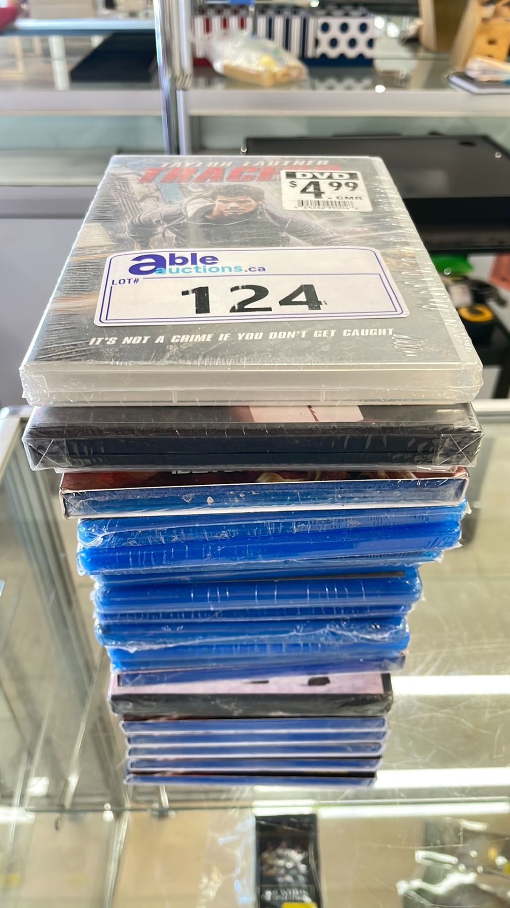 Blue Stack Dvd STACK OF ASSORTED DVDS & BLUE RAYS - Able Auctions