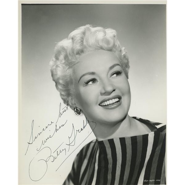 Pin Up Girl Betty Grable signed photo. GFA Authenticated