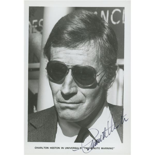 Two Minute Warning Charlton Heston signed movie photo. GFA Authenticated