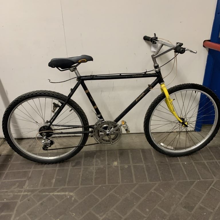 BLACK AND YELLOW RALEIGH BIKE