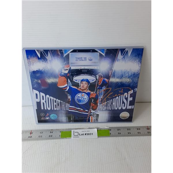Autographed Taylor Hall Photo with Certificate of Authenticity 10.25" x 8.25"