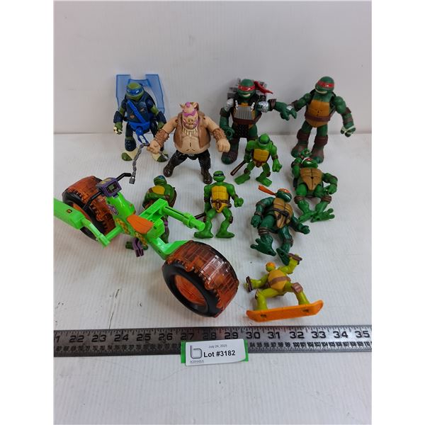(9) "Teenage Mutant Ninja Turtles" Action Figures & Vehicle