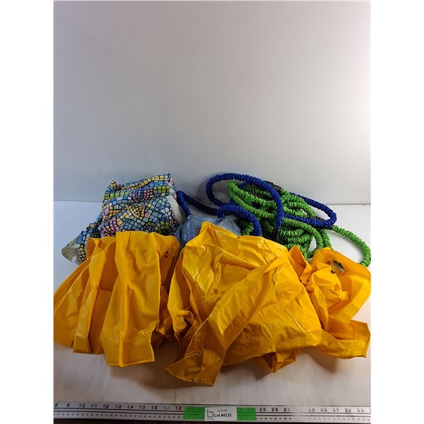 Inflatable Beach Ball, Water Hose, Table Cover and (2) Kid's Rain Jackets