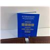 Image 3 : Intermediate Accounting and Websters Dictionary Books