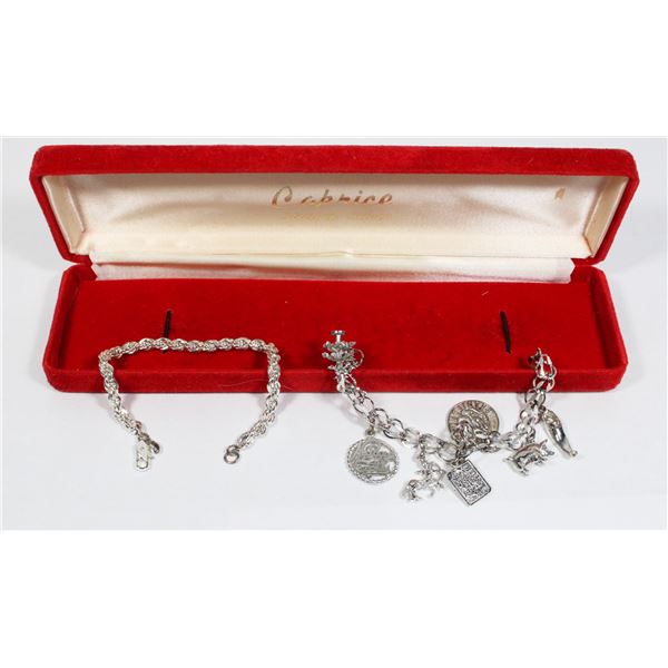 TWO CAPRICE STIRLING SILVER CHARM BRACELETS TOGETHER