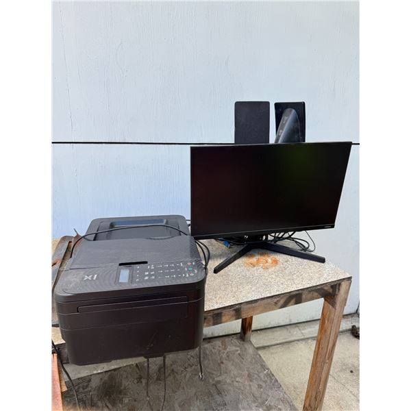 Samsung TV and Lenovo item with speakers and printer