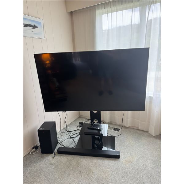 Sony 65 inch TV with stand and LG sound bar subwoofer