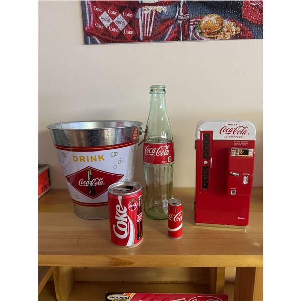 Coca-Cola coin, bank, tin pail, and other items