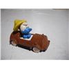 Image 3 : Erte smurf about by car