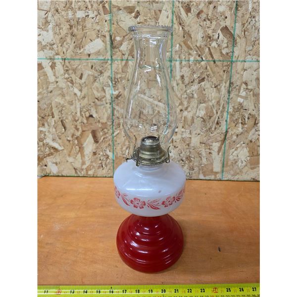 Vintage coral red kerosene lamp