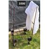 Image 1 : Rolling metal cart with bag.