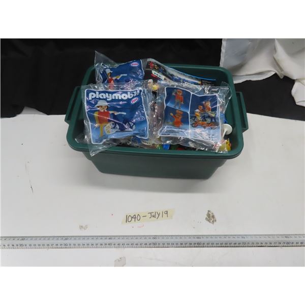 Box full of playmobil toys