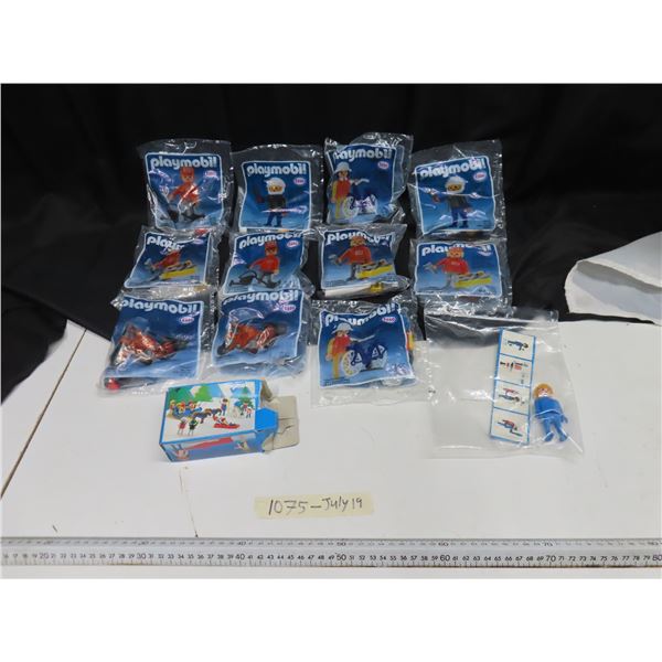 Mostly unopened bags of Playmobil toys