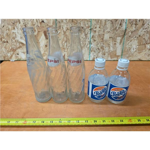 5 vintage pepsi bottles