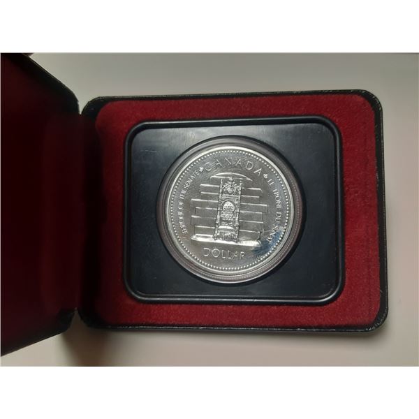 1977 Canadian Silver Dollar commemorating the "Throne of the Senate" and Queen Elizabeth II's Silver