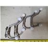 Image 1 : 4 silver colored coat hangers