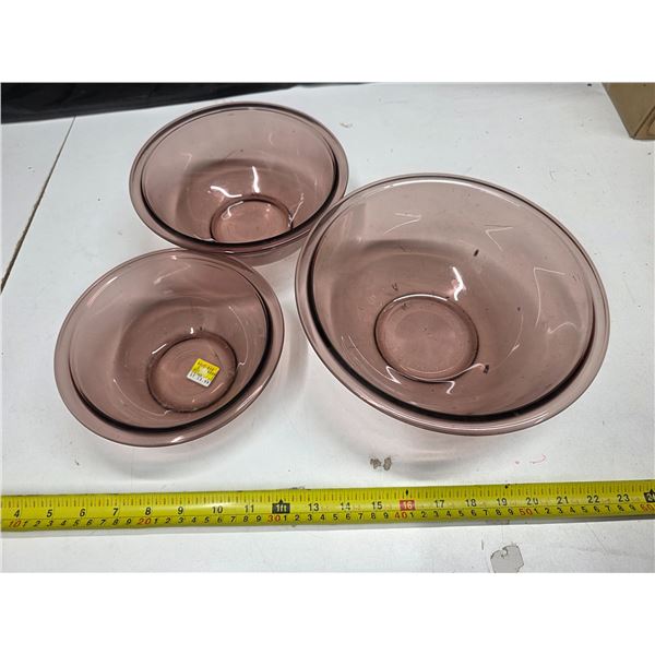 3 Pyrex cranberry colored bowls