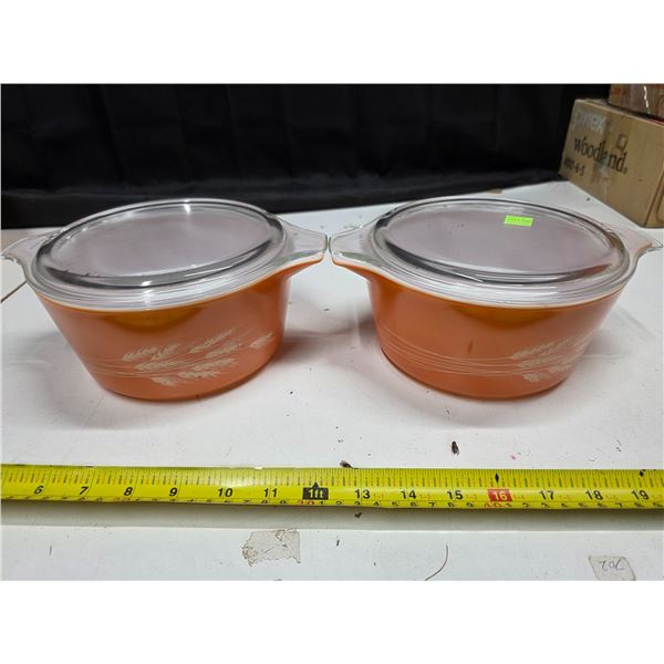 2 pyrex orange casserole dishes