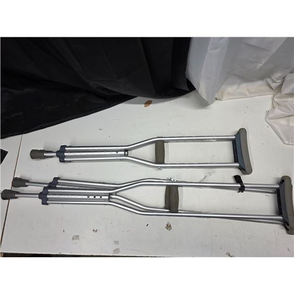 2 pairs of crutches