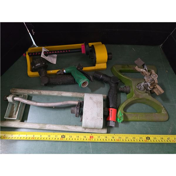 lot of sprinklers and nozels for hoses