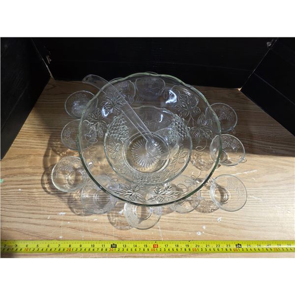 Glass punch bowl with cups and ladle