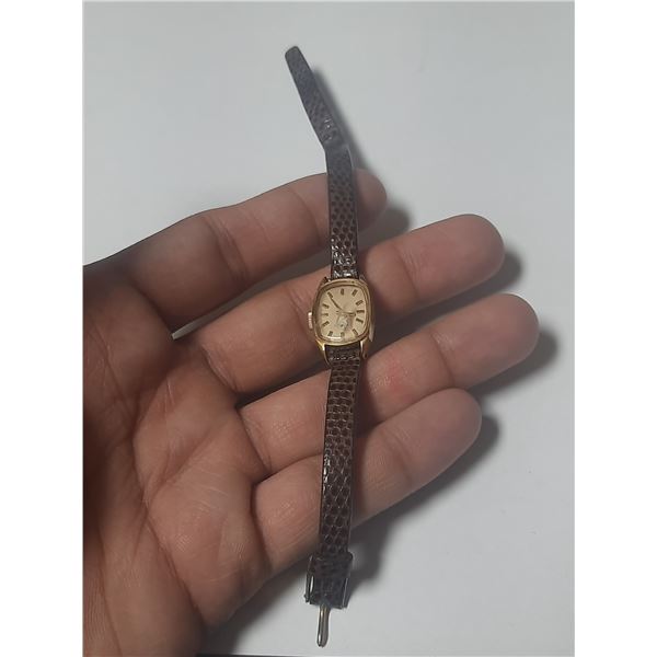 VINTAGE LADIES MOVADO, MAN WIND