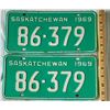 Image 1 : Set of two matching 1969 Saskatchewan license plates, white print on green background 86-379.