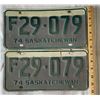 Image 1 : Set of two 74 weathered Saskatchewan farm license plates F29 - 079, green print on white and grey ba
