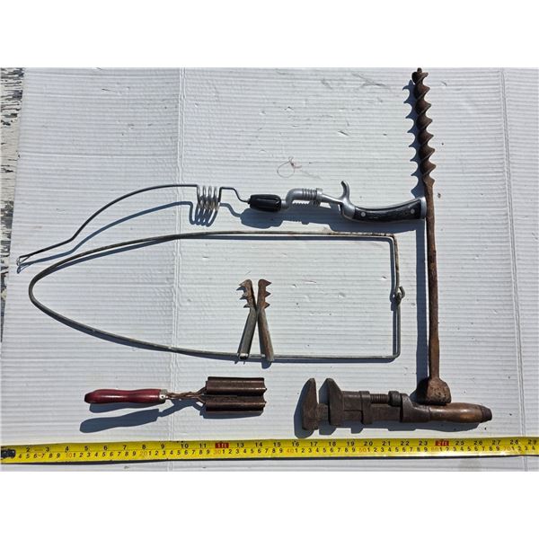 Various metal tools- vintage tanning stretcher and others