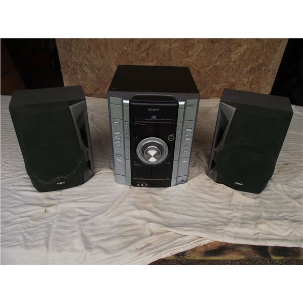 Stereo unit with speakers and wiring. Dual cassette, 3 CD changer and AM/FM radio. Works well.