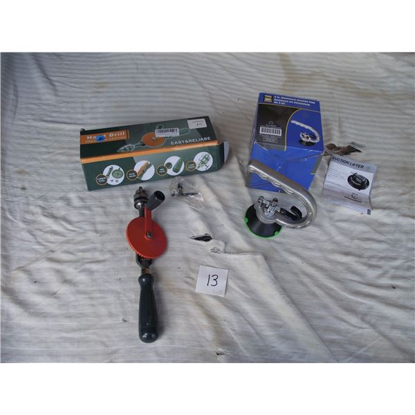 1 Hand drill (new in box) & 1 suction cup (new in box)