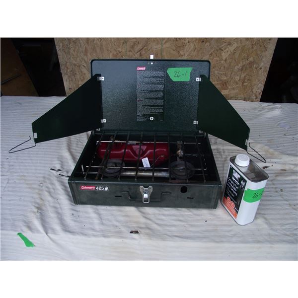 Coleman camp stove model 425 c/w 1/2 can of fuel.