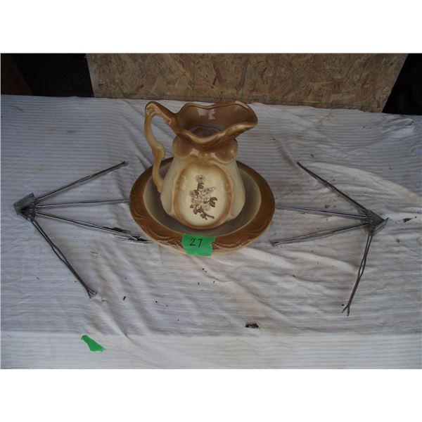 Water pitcher and basin, with two towel racks.