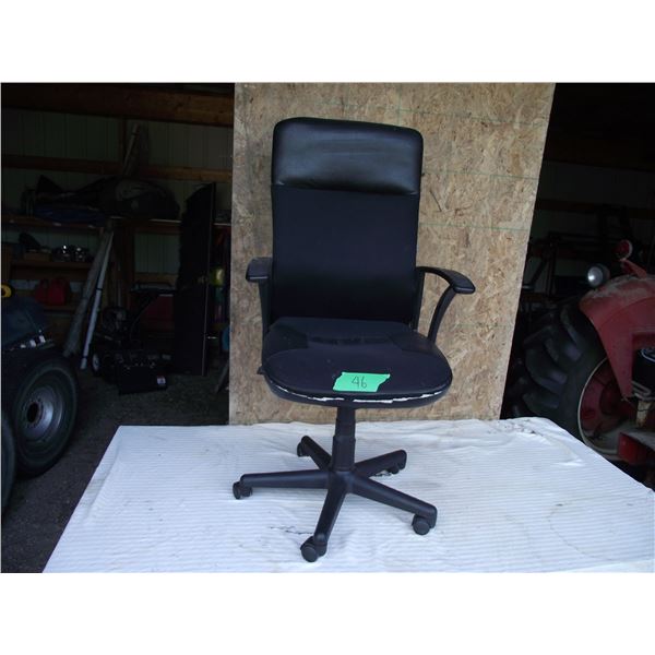 Office chair, nice shape with high back support.