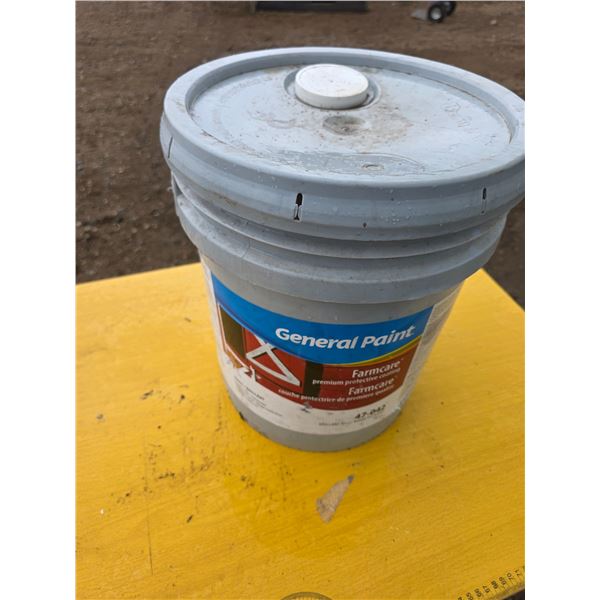 Full bucket of coating for walls