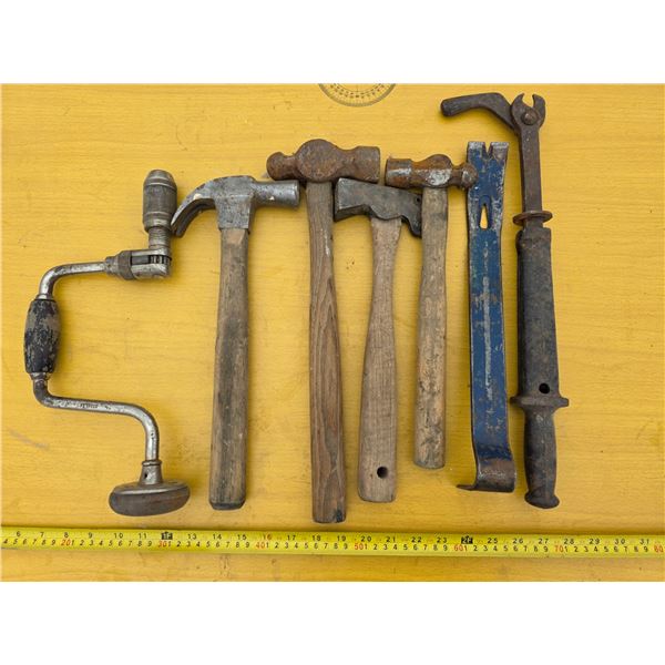 Lot of antique hammers and tools
