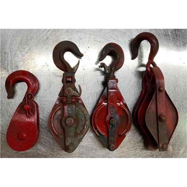 Four Small Snatch Blocks. 8”-13”
