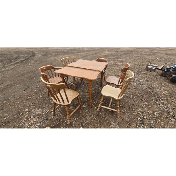 chairs and table with extra leaf