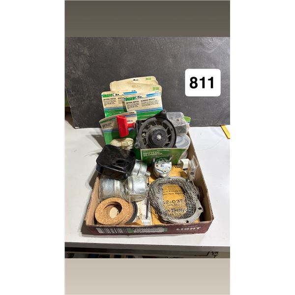 Box of assorted small engine parts