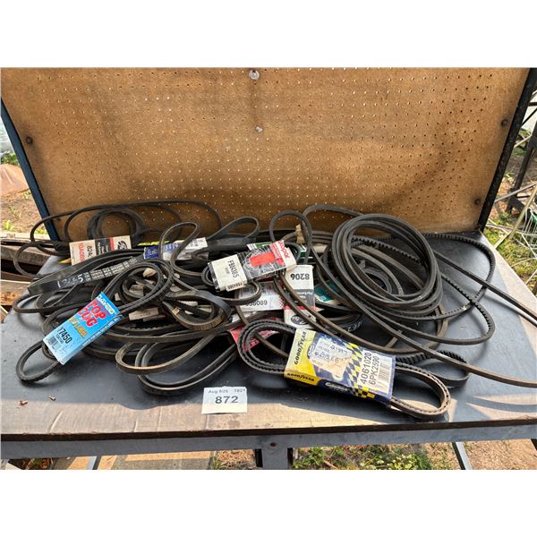 Lot of miscellaneous fan belts/measuring tool