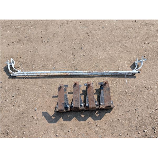 (4) Trailer Tie Downs and (2) roof Racks