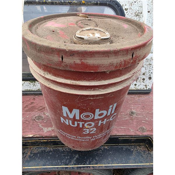 New pail of hydraulic oil