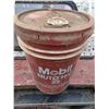 New pail of hydraulic oil