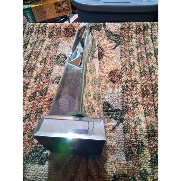 Rotating mirrored obelisk