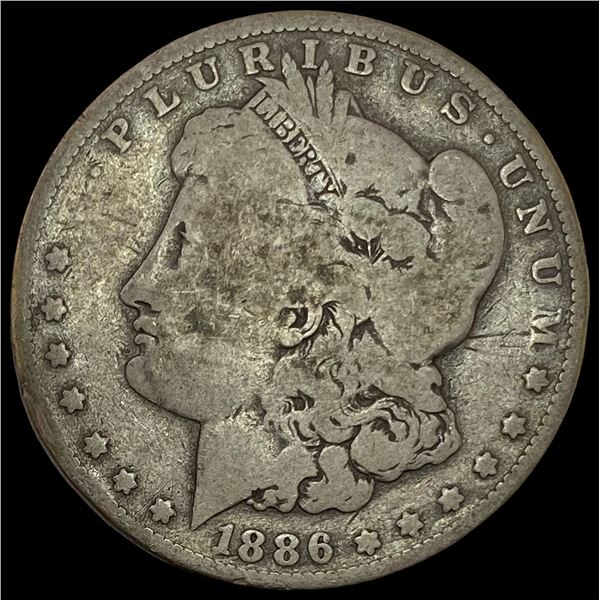 1886 Morgan Silver Dollar ABOUT UNCIRCULATED