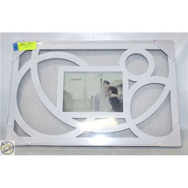 2 WHITE PICTURE FRAMES WITH CIRCLES