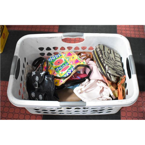 LAUNDRY BASKET FULL OF PURSES ETC