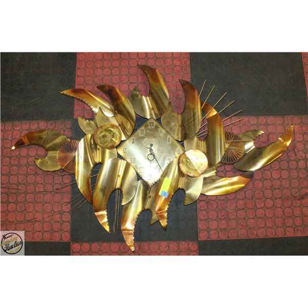 POINTY METAL WALL HANGING CLOCK